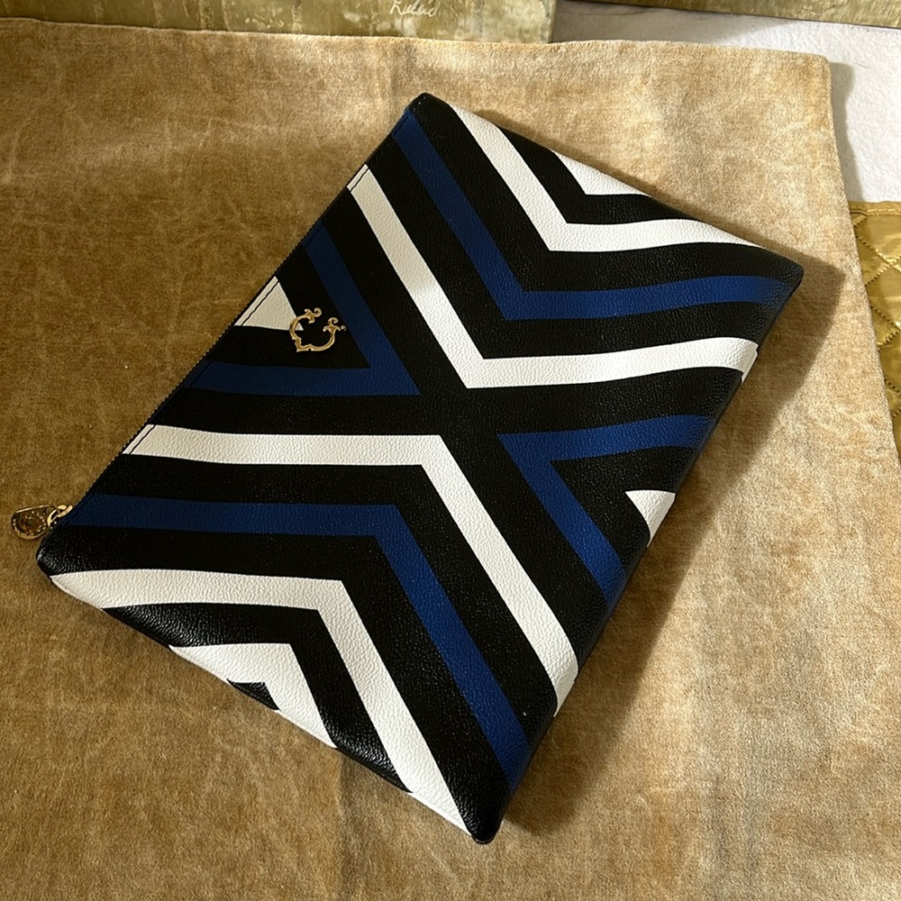 C. Wonder Geometric striped clutch
